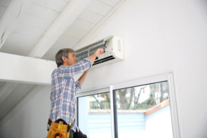 Vigilant Man Repairing Home Ac Shutterstock 176086514