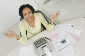 Cost Frustrated Lady With House Expenses Shutterstock 120499132