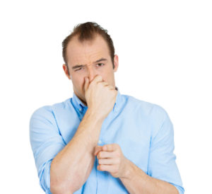 Vigilant Man Smells Something Awful Shutterstock 178681403